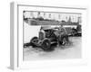 Young Woman Sitting Next to Small Car Looking at the Engine with Her German Shepherd-null-Framed Photo