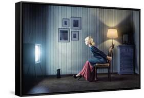 Young Woman Sitting on a Chair in Vintage Interior and Watching Retro TV-viczast-Framed Stretched Canvas