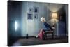Young Woman Sitting on a Chair in Vintage Interior and Watching Retro TV-viczast-Stretched Canvas