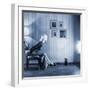 Young Woman Sitting on a Chair in Vintage Interior and Watching Retro TV-viczast-Framed Photographic Print