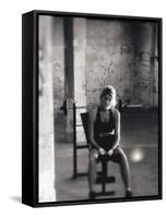 Young Woman Sitting on a Weight Bench-null-Framed Stretched Canvas