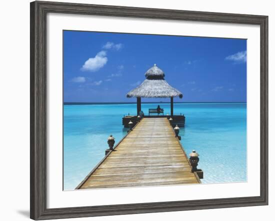 Young Woman Sitting on Bench at the End of Jetty, Maldives, Indian Ocean-Papadopoulos Sakis-Framed Photographic Print