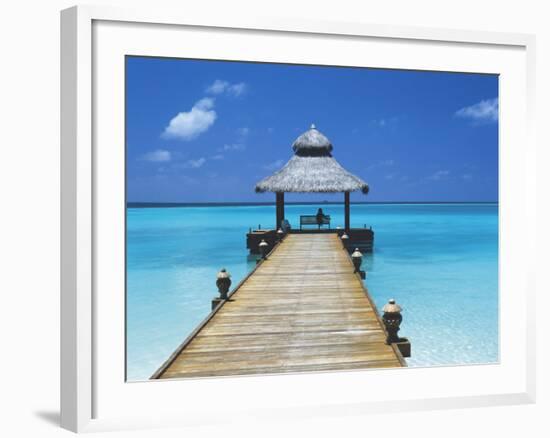 Young Woman Sitting on Bench at the End of Jetty, Maldives, Indian Ocean-Papadopoulos Sakis-Framed Photographic Print