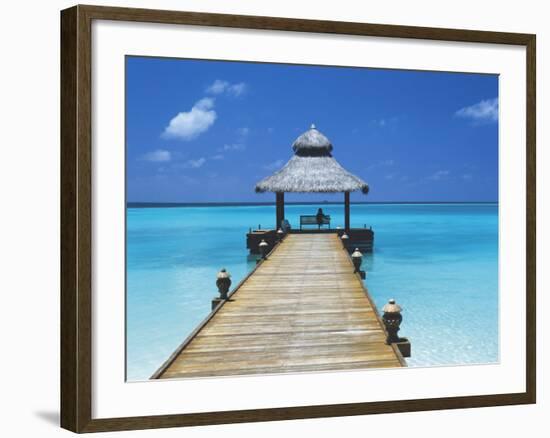 Young Woman Sitting on Bench at the End of Jetty, Maldives, Indian Ocean-Papadopoulos Sakis-Framed Photographic Print