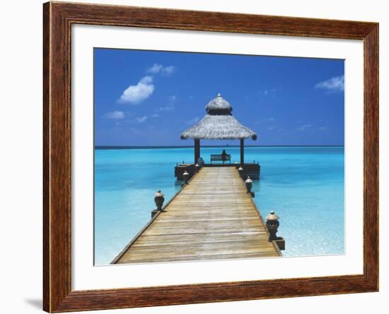 Young Woman Sitting on Bench at the End of Jetty, Maldives, Indian Ocean-Papadopoulos Sakis-Framed Photographic Print