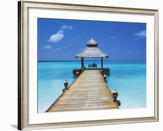 Young Woman Sitting on Bench at the End of Jetty, Maldives, Indian Ocean-Papadopoulos Sakis-Framed Photographic Print