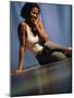 Young Woman Sitting on the Floor Smiling-null-Mounted Photographic Print