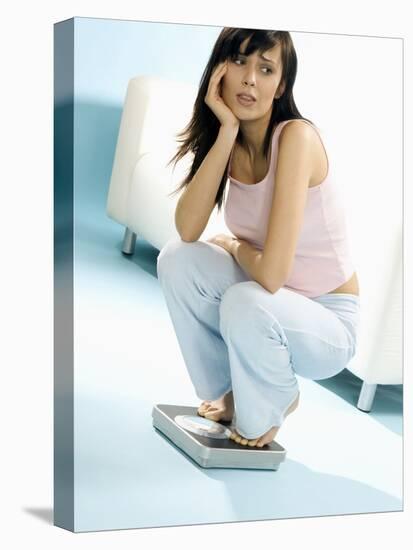 Young Woman, Squatting on Scales, Chin in Hand-null-Stretched Canvas