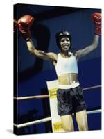 Young Woman Standing in a Boxing Ring-null-Stretched Canvas