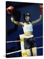 Young Woman Standing in a Boxing Ring-null-Stretched Canvas