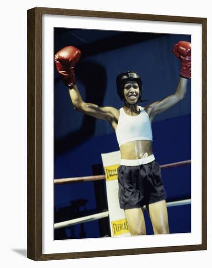 Young Woman Standing in a Boxing Ring-null-Framed Premium Photographic Print