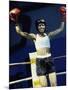 Young Woman Standing in a Boxing Ring-null-Mounted Photographic Print
