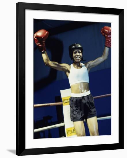 Young Woman Standing in a Boxing Ring-null-Framed Photographic Print