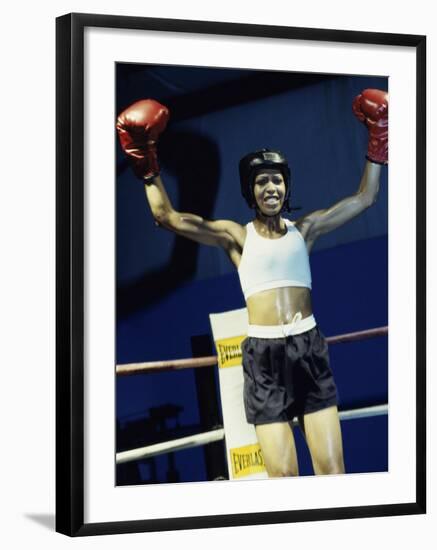 Young Woman Standing in a Boxing Ring-null-Framed Photographic Print