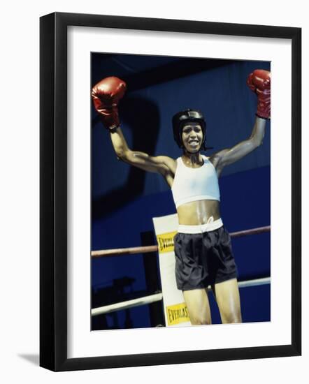 Young Woman Standing in a Boxing Ring-null-Framed Photographic Print