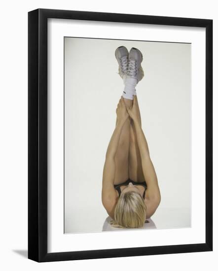 Young Woman Stretching-null-Framed Photographic Print
