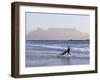 Young Woman Surfer Enters the Water of the Atlantic Ocean with Table Mountain in the Background-Yadid Levy-Framed Photographic Print