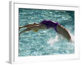 Young Woman Swimming the Backstroke in a Swimming Pool, Bainbridge Island, Washington, USA-null-Framed Photographic Print