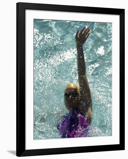 Young Woman Swimming the Backstroke in a Swimming Pool, Bainbridge Island, Washington, USA-null-Framed Photographic Print