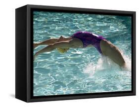 Young Woman Swimming the Backstroke in a Swimming Pool, Bainbridge Island, Washington, USA-null-Framed Stretched Canvas