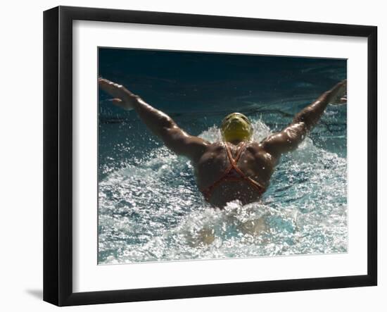 Young Woman Swimming the Butterfly Stroke in a Swimming Pool, Bainbridge Island, Washington, USA-null-Framed Premium Photographic Print