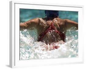 Young Woman Swimming the Butterfly Stroke in a Swimming Pool, Bainbridge Island, Washington, USA-null-Framed Photographic Print