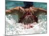 Young Woman Swimming the Butterfly Stroke in a Swimming Pool, Bainbridge Island, Washington, USA-null-Mounted Photographic Print