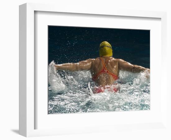 Young Woman Swimming the Butterfly Stroke in a Swimming Pool, Bainbridge Island, Washington, USA-null-Framed Photographic Print