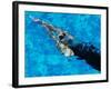 Young Woman Swimming Underwater in a Swimming Pool-null-Framed Photographic Print