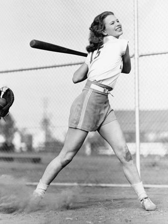 Young Woman Swinging a Baseball Bat in a Baseball Field' Photographic Print  - Everett Collection | AllPosters.com