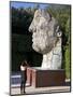 Young Woman Taking Photograph of the Monumental Head, by Igor Mitora, Boboli Gardens, Florence, Tus-Peter Barritt-Mounted Photographic Print