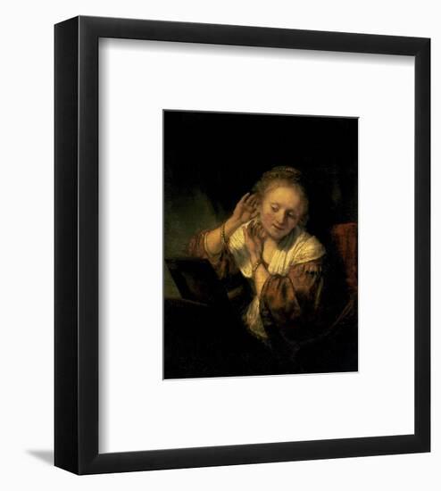 Young Woman Trying Earrings, 1654-Rembrandt van Rijn-Framed Art Print