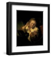 Young Woman Trying Earrings, 1654-Rembrandt van Rijn-Framed Art Print