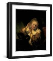 Young Woman Trying Earrings, 1654-Rembrandt van Rijn-Framed Art Print