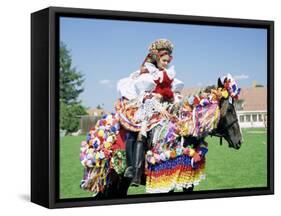 Young Woman Wearing Folk Dress on Horseback, Ride of the Kings Festival, Village of Vlcnov, Vlcnov-Richard Nebesky-Framed Stretched Canvas