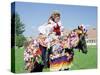 Young Woman Wearing Folk Dress on Horseback, Ride of the Kings Festival, Village of Vlcnov, Vlcnov-Richard Nebesky-Stretched Canvas