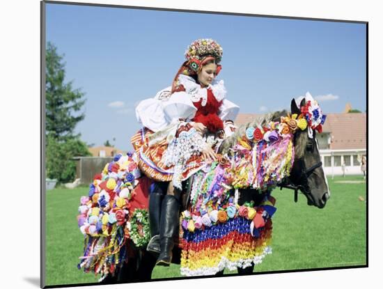 Young Woman Wearing Folk Dress on Horseback, Ride of the Kings Festival, Village of Vlcnov, Vlcnov-Richard Nebesky-Mounted Photographic Print