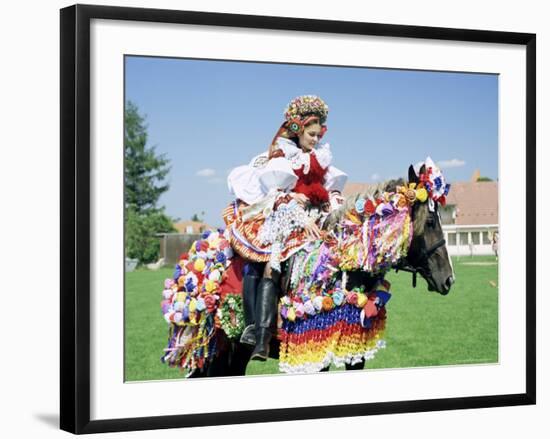 Young Woman Wearing Folk Dress on Horseback, Ride of the Kings Festival, Village of Vlcnov, Vlcnov-Richard Nebesky-Framed Photographic Print