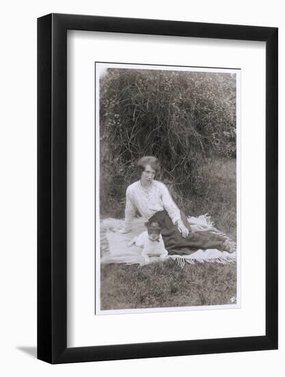 Young Woman with a Dog in a Garden-null-Framed Photographic Print