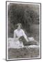 Young Woman with a Dog in a Garden-null-Mounted Photographic Print