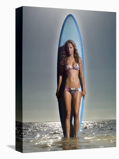 Young Woman with a Surfboard-Ben Welsh-Stretched Canvas