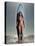 Young Woman with a Surfboard-Ben Welsh-Stretched Canvas