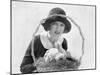 Young Woman with an Easter Basket and a Bunny-null-Mounted Photo