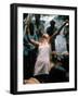 Young Woman with Flute Ecstatically Raising Her Arms, Amid Crowd at Woodstock Music Festival-Bill Eppridge-Framed Photographic Print