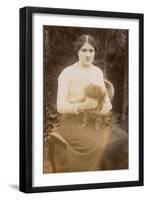 Young Woman with Pekingese Dog in a Garden-null-Framed Premium Photographic Print