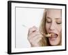 Young Womand Eating Cornflakes from a Spoon-null-Framed Photographic Print