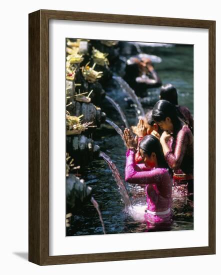 Young Women at Tirta Empul Temple, Ubud Region, Island of Bali, Indonesia, Southeast Asia-Bruno Morandi-Framed Photographic Print