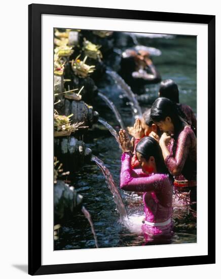 Young Women at Tirta Empul Temple, Ubud Region, Island of Bali, Indonesia, Southeast Asia-Bruno Morandi-Framed Photographic Print