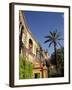 Young Women in Flamenco Dresses Under Arch in the Alcazar, Cordoba, Spain-Merrill Images-Framed Photographic Print