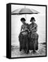 Young Yap Island ladies sporting traditional Grass Skirts, Sharing umbrella in the Caroline Islands-Eliot Elisofon-Framed Stretched Canvas